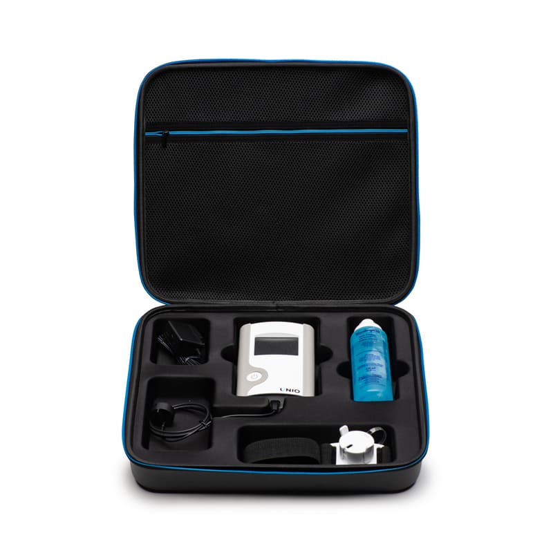 Image of UNIO device kit with ultrasound gel, transducer holder and strap